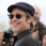 Brad Pitt mit Sonnenbrille und Mütze in Cannes