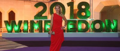 Angelique Kerber strahlt im roten Abendkleid beim Champions Dinner in Wimbledon. Foto: dpa
